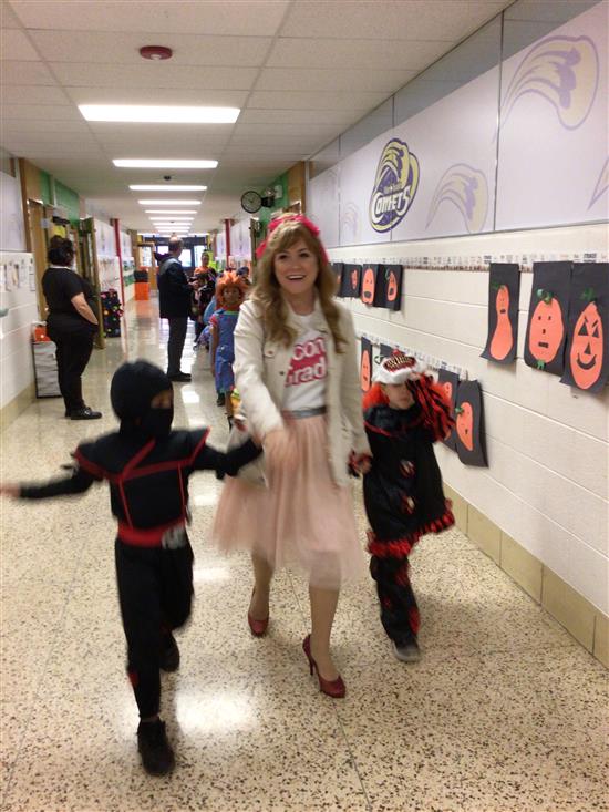 Students walking in Halloween Parade